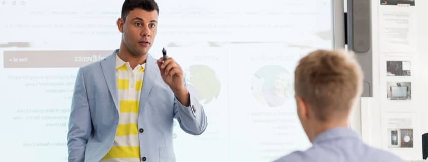 A man teaching another man